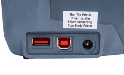 Side view of the M510 printer showing the USB ports